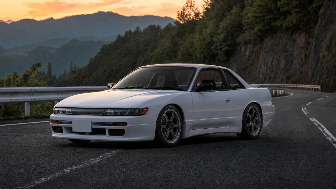 White Nissan Silvia S13 on a mountain pass